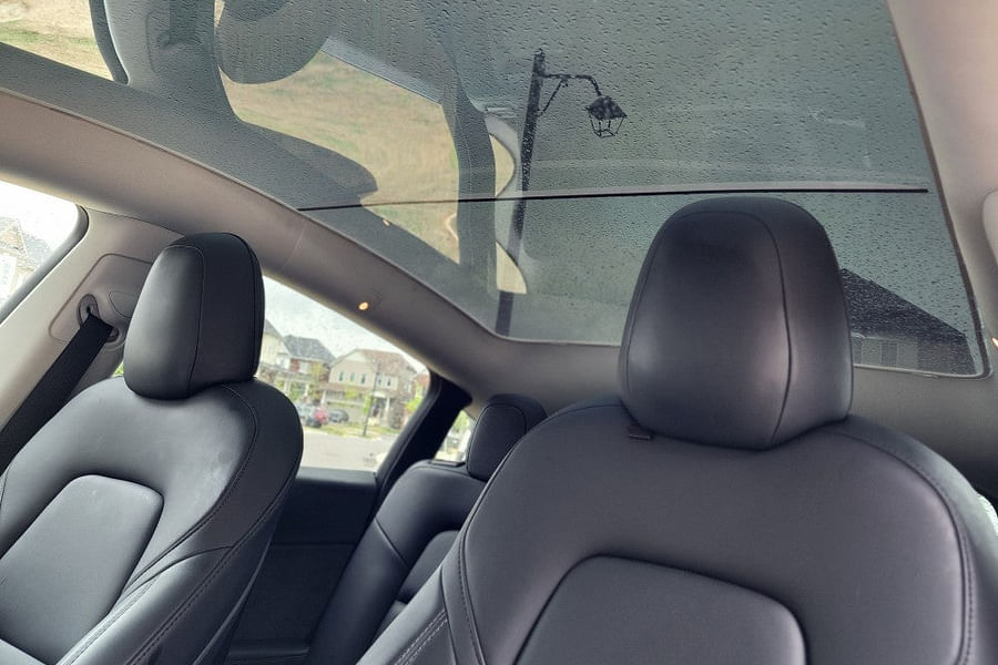 Tesla Model Y panoramic glass roof and interior