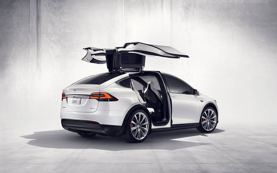 Tesla Model X in a scenic outdoor setting